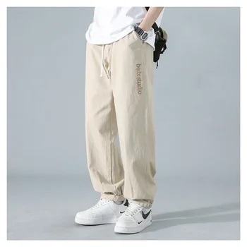Çok yönlü Banliyö erkek Giyim İlkbahar ve Sonbahar Yeni Ekleme Cepler İpli Düz Renk Düz Varil iş pantolonu